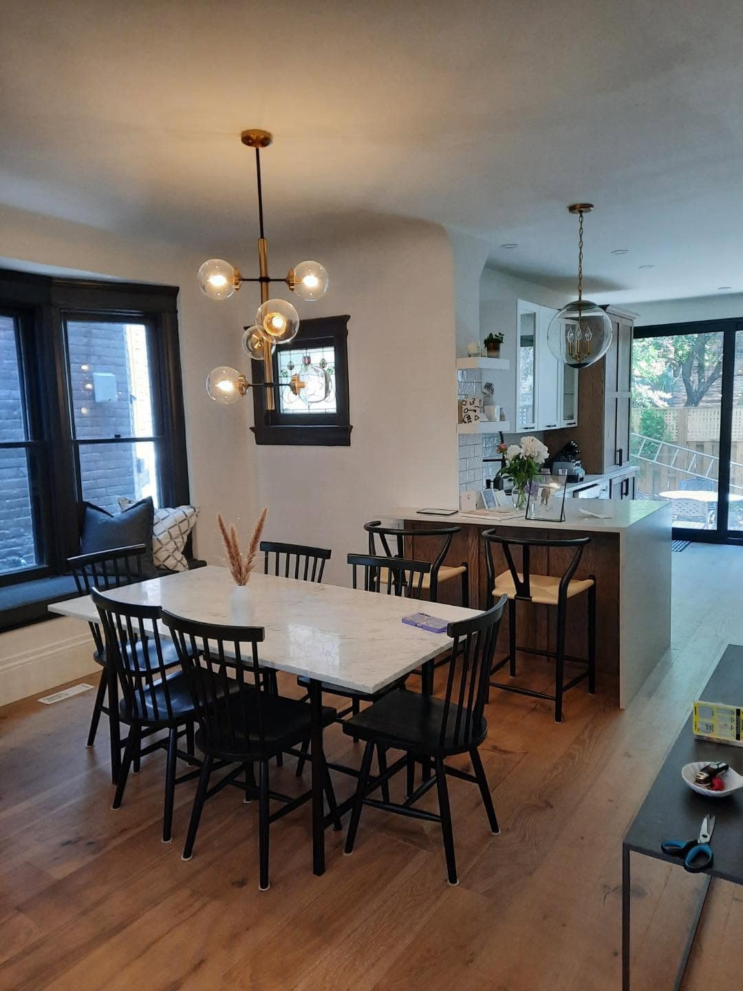 Open-concept kitchen and dining renovation by SB Home Renovations